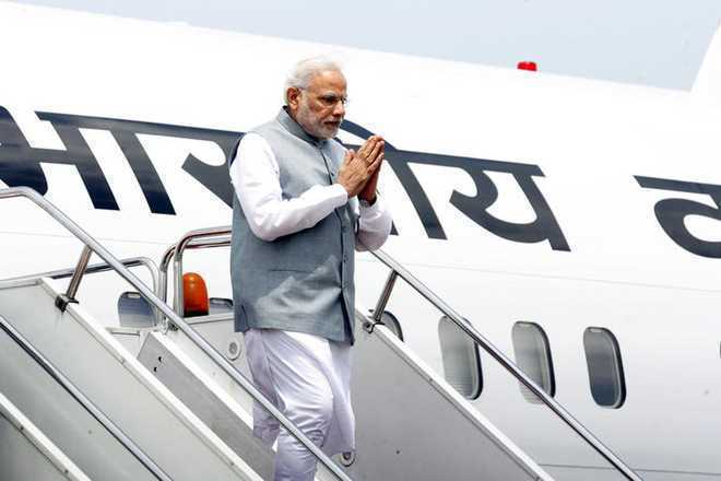 rs44652crorespentonpmnarendramodisforeignvisitsinlastfiveyears:mea