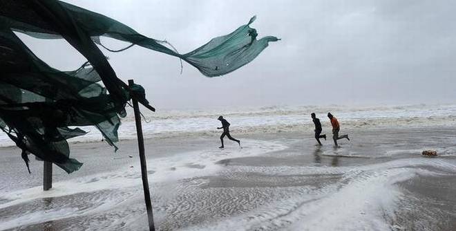 cyclonevayuweakenscrosseskutchcoastingujarat