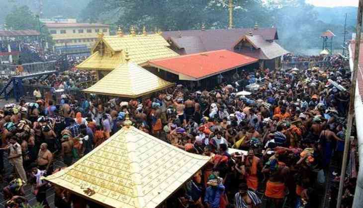 womanjournalistbeginsclimbingsabarimalahill