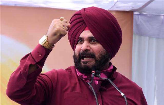 navjotsidhuresignsaspunjabcongresschief