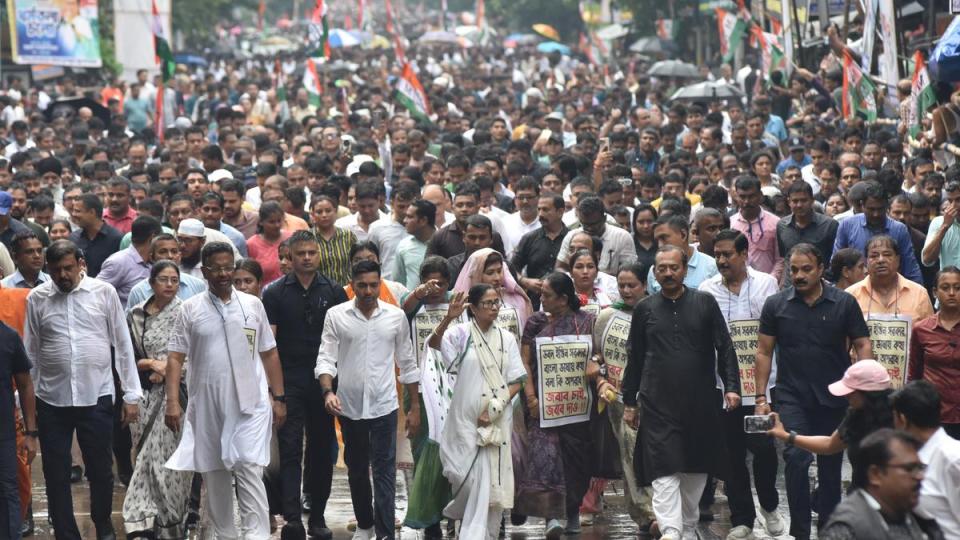Mamata Banerjee leads march over 