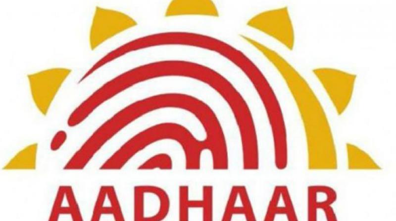aadhaarnumbersmaybeprintedonchequessoon