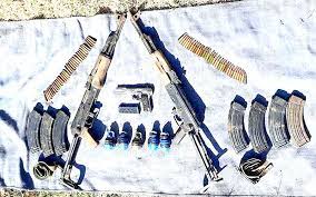 securityforcesrecoverarmsandammunitioninpoonchdistrict