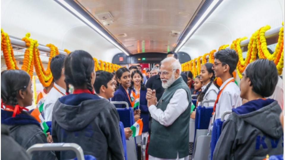 PM Narendra Modi interacts with students on Vande Bharat train