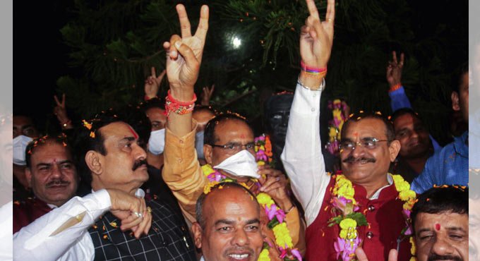 bjpwins19outof28seatscongressbagsnineinmadhyapradesh