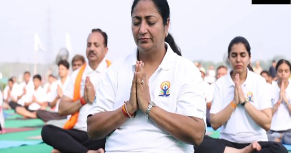 Delhi CM performs yoga on banks of Yamuna