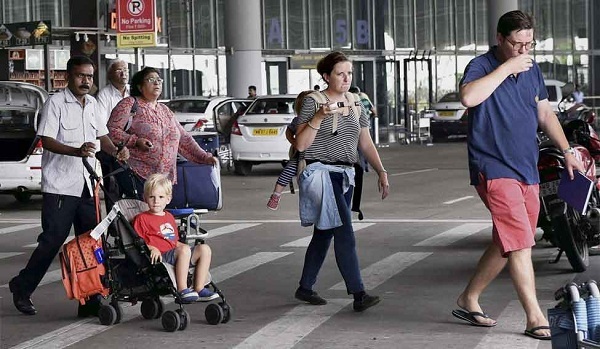governmenttoeasetravelcurbsforforeignindiannationals