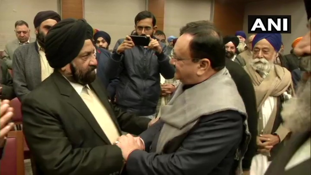 caanrcwillbeimplemented:jpnaddatellsafghansikhrefugeesasprotestsrockdelhi