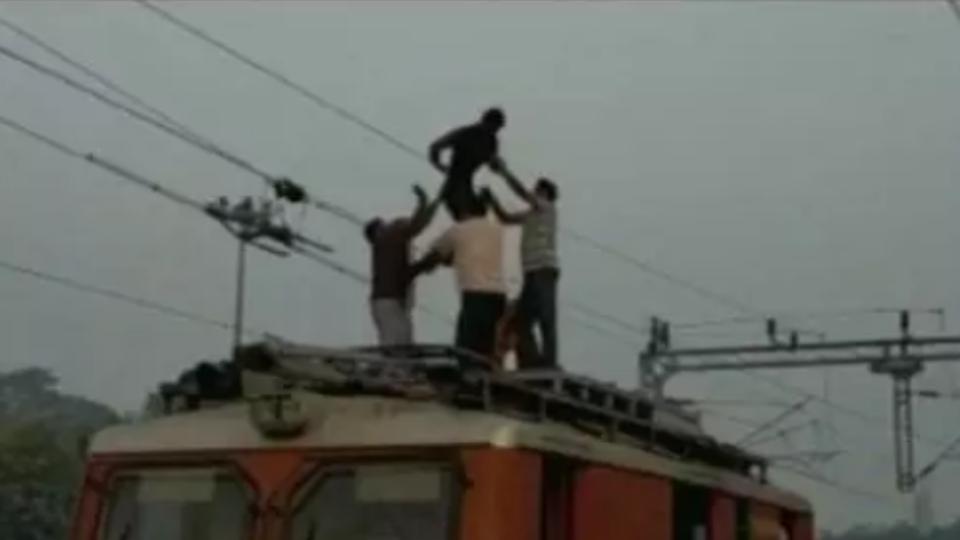 Passenger Climbs Atop Train, Tries To Catch High Tension Wires in Andhra