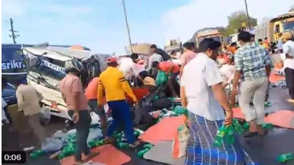 Soft Drink Bottles Looted after Lorry Accident in Nellore