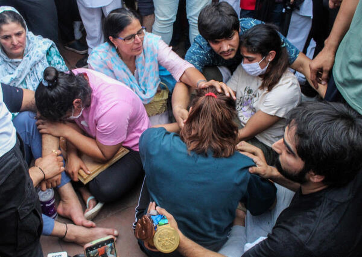 Protesting wrestlers defer plan to immerse medals in Ganga
