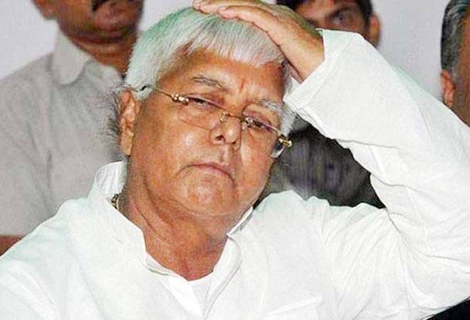 cbiraids12premisesoflaluprasadandfamilyovertenderirregularities