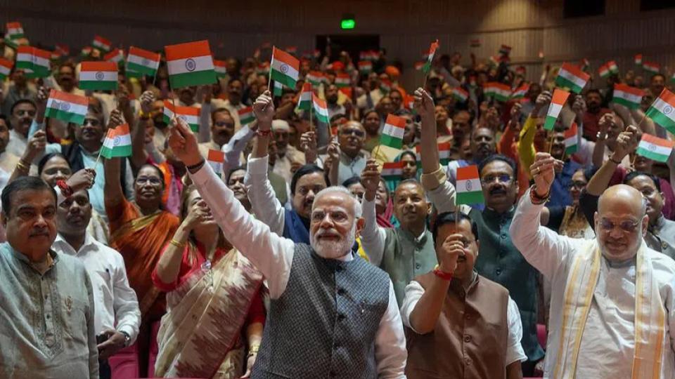 NDA MPs greets PM Modi by waving tricolour, raising slogans 