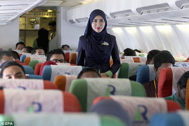 femalestaffinhijabsprayersbeforetakeoffandnoalcohol:malaysiasfirstshariahairline