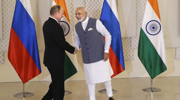 pmmodimeetsrussianpresidentputinholdtalks