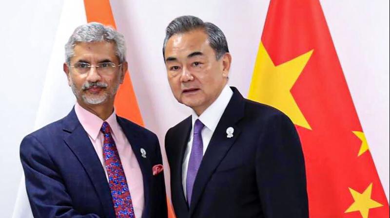 eamsjaishankarmeetschineseforeignministerwangyionsidelinesofscosummit